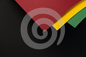 February Black History Month. Abstract Paper geometric black, red, yellow, green background. Copy space, place for your text
