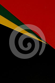 February Black History Month. Abstract Paper geometric black, red, yellow, green background. Copy space, place for your text