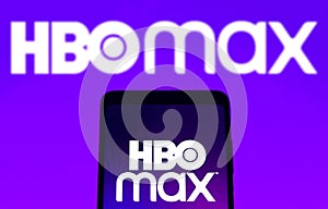 February 3, 2022, Brazil. In this photo illustration, the HBO Max logo is displayed on a smartphone screen and in the background