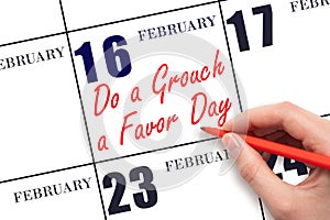 February 16. Hand writing text Do a Grouch a Favor Day on calendar date. Save the date.