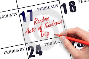 February 17. Hand writing text Random Acts of Kindness Day on calendar date. Save the date.