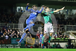 Alan Bennett and Ismahil Akinade during the Cork City FC vs Waterford FC match at Turners Cross for the League of Ireland Premier