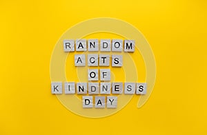 Random Acts of Kindness Day, a minimalistic banner with an inscription in wooden letters photo