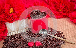 14 February rosted  coffee beans with heart chocolates red flowers red mug photo