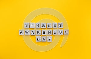 Singles Awareness Day, Singles Appreciation Day, minimalistic banner with the inscription in wooden letters