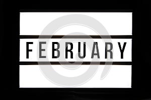 FEBRUARY text in a light box