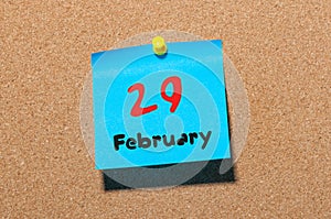 February 29th. Calendar for februar 29 on cork notice board background. empty space. Leap year, intercalary day photo