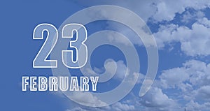 february 23. 23-th day of the month, calendar date.White numbers against a blue sky with clouds. Copy space, winter