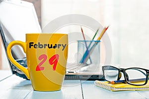 February 29th. Day 29 of month, calendar on editor workspace background. Leap year concept. Winter time. Empty space for photo
