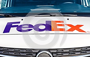 Fed Ex on front of a delivery Truck