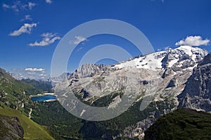 Fedaia lake with Marmolada mount