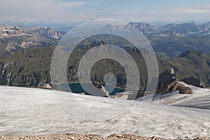 Fedaia lake between mountain massif, Trentino, Province of Belluno, Italy