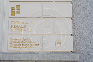 Federal Criminal Court sign hanging at the building in Bellinzona