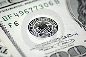 Federal reserve system bank symbol seal close up US United States USA fed funds interest rate rates inflation policy dollar bill