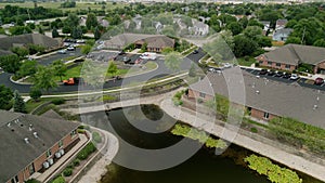 Fedex Delivery Truck in Suburban Neighborhood. wide view, Naperville , IL , United States - 08 14 2022: