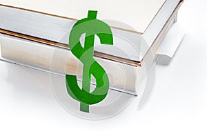 Fee-paying education set with dollar sign on white table top view