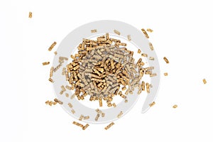 Feed for livestock. Pig feed pellets,feed  for hamster, rabbits or mouse on a white background photo