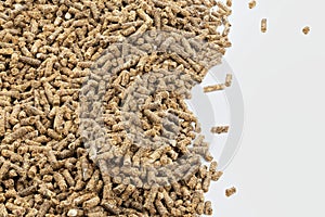 Feed for livestock. Pig feed pellets,feed  for hamster, rabbits or mouse on a white background photo