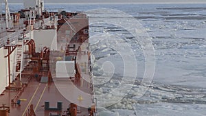 Feed of a ship sailing in the Arctic. Landscape of the Arctic from the deck of the tanker.