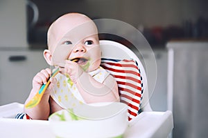 Feeding. Baby`s first solid food