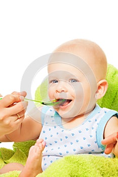 Feeding baby from spoon