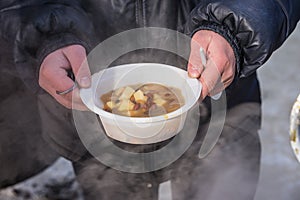 Feeding homeless people on the street