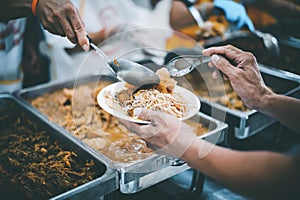 Feeding to hand the poor helping  beggar in social, Poverty concept