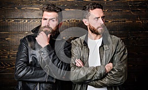 Feel confident in brutal leather clothes. Brutal men wear leather jackets. Men brutal bearded hipster posing in