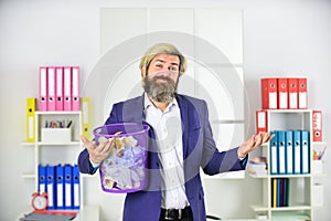 Feel the maze. crumpled paper in wastepaper basket. man read piece of paper. office worker digging in garbage bin