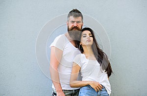 Feel their style. Couple friends hang out together grey wall background. Youth stylish outfit. Couple white shirts