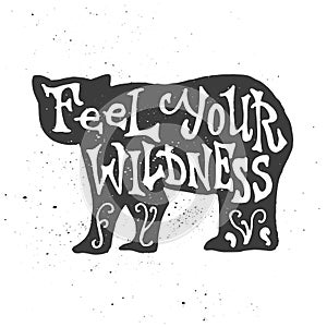 Feel your wildness lettering in bear silhouette. photo