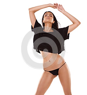 Feeling free to express her sensuality. A gorgeous young woman expressing herself in her underwear while  on