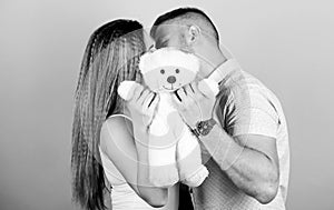 Feeling happiness. valentines day present. sexy girl and man hold teddy bear. man and woman embrace. family values