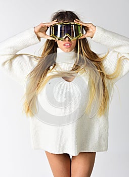 Feeling rested. Winter time fun. Ski resort and snowboarding. Winter sport and activity. Happy winter holidays. Girl in