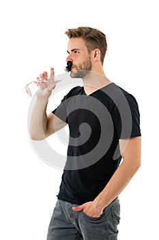 Feeling thirsty. Man athlete hold water bottle. Guy drink water on white background. Man care health and water balance