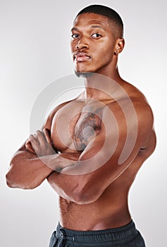 Feelings arent always logical, theyre always valid. Studio shot of a handsome shirtless young man posing against a white