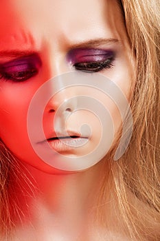 Feelings, emotional frown model face with make-up photo