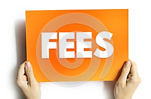 FEES - the price one pays as remuneration for rights or services, text concept on card