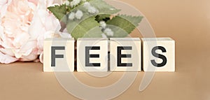with fees on wooden background