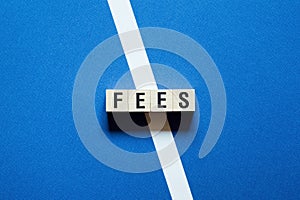Fees word concept on cubes