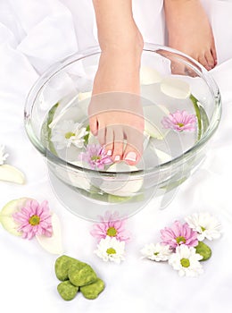 Feet in aromatherapy bowl