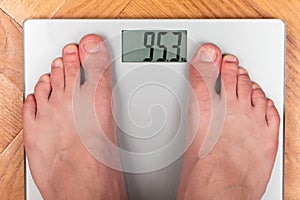 Feet on bathroom scale