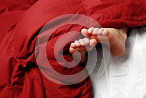 Feet in Bed