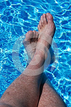 Feet in Blue Water