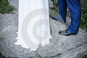 Feet of bride and groom