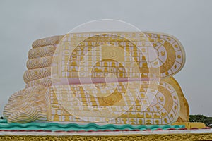 The feet of the Buddha in a reclining Buddha statue in Pegu in Myanmar