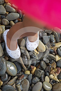 Feet of child in the sea