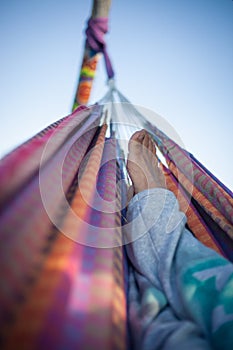 Feet in colorful hammock