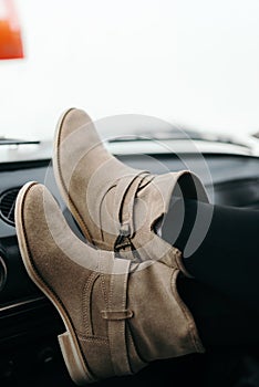 Feet of the girl in the car