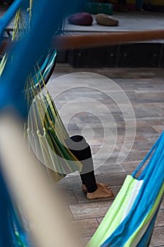 Feet hanging off a hammock